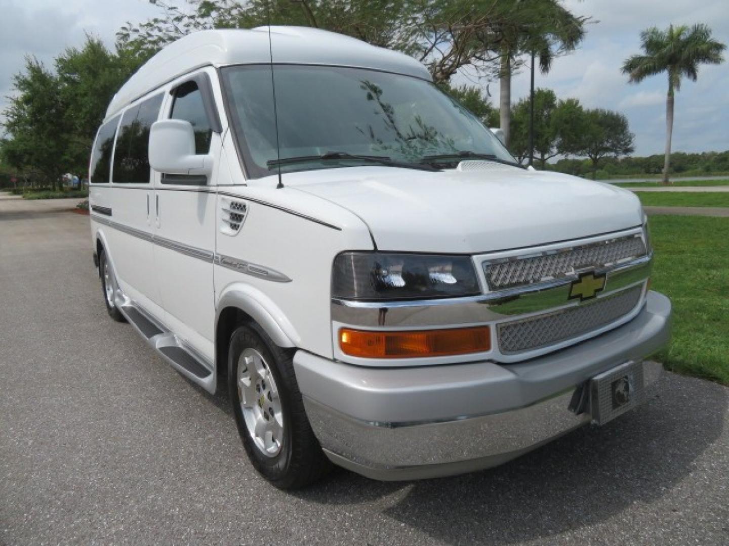 2010 White /Gray Chevrolet Express (1GNUGCD48A1) , located at 4301 Oak Circle #19, Boca Raton, FL, 33431, (954) 561-2499, 26.388861, -80.084038 - You are looking at a Gorgeous 2010 Chevy Express Handicap Wheelchair Conversion Van Explorer Limited SE with 31K Original Miles, Braun Century 750lb Side Entry Wheelchair lift, Tie Down System in the Floor, Rear Entertainment with Flat Screen TV/DVD, Leather Interior, Rear Power Folding Bench Seat/b - Photo#8